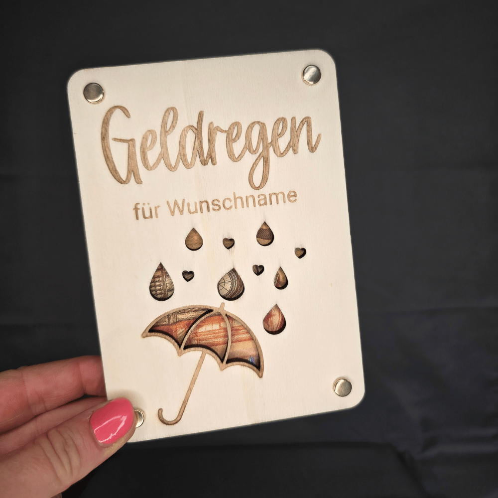 Geldgeschenk einpacken: Geldschein hinter der Holzplatte mit Regenschirm, Herzen und Regentropfen