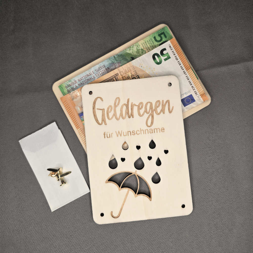Geldgeschenk Idee mit Regenschirm-Motiv aus Pappelholz, ausgeschnittene Regentropfen mit Muster