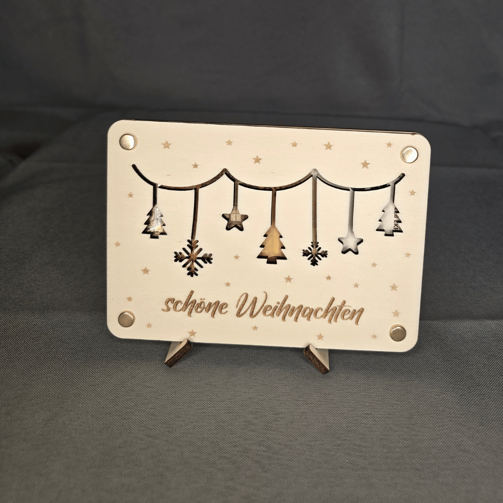 Geld verschenken zu Weihnachten in stilvoller Verpackung mit Girlanden-Motiv